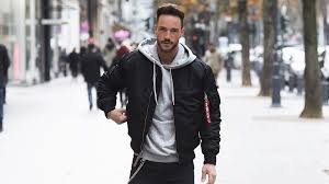 Essentials Hoodie is Outerwear that Elevates Streetwear Looks